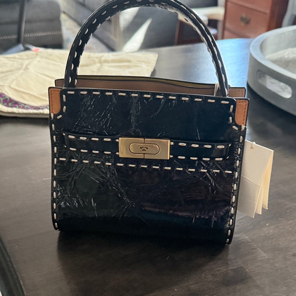 Tory Burch Brand new Black Patent Mini Radziwill with Contrast Stitching.